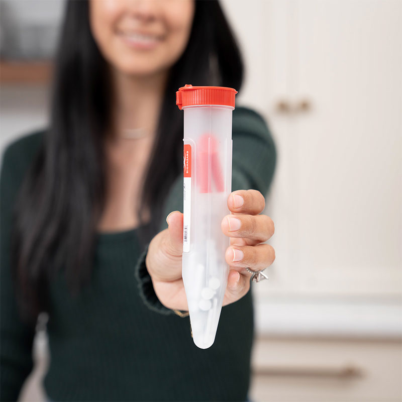 Travel-size-sharps-container-for-safe-disposal-of-needles